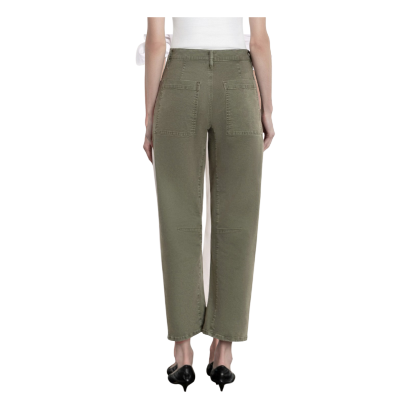 Person wearing olive green pants on a white background