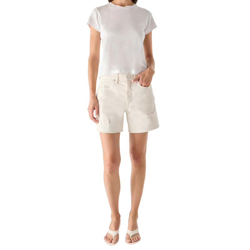Person wearing a white t-shirt and beige shorts on a white background