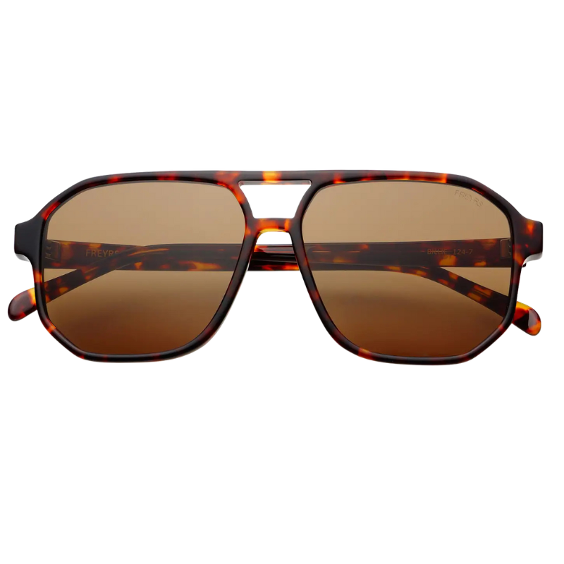 Tortoiseshell sunglasses with brown lenses on a white background