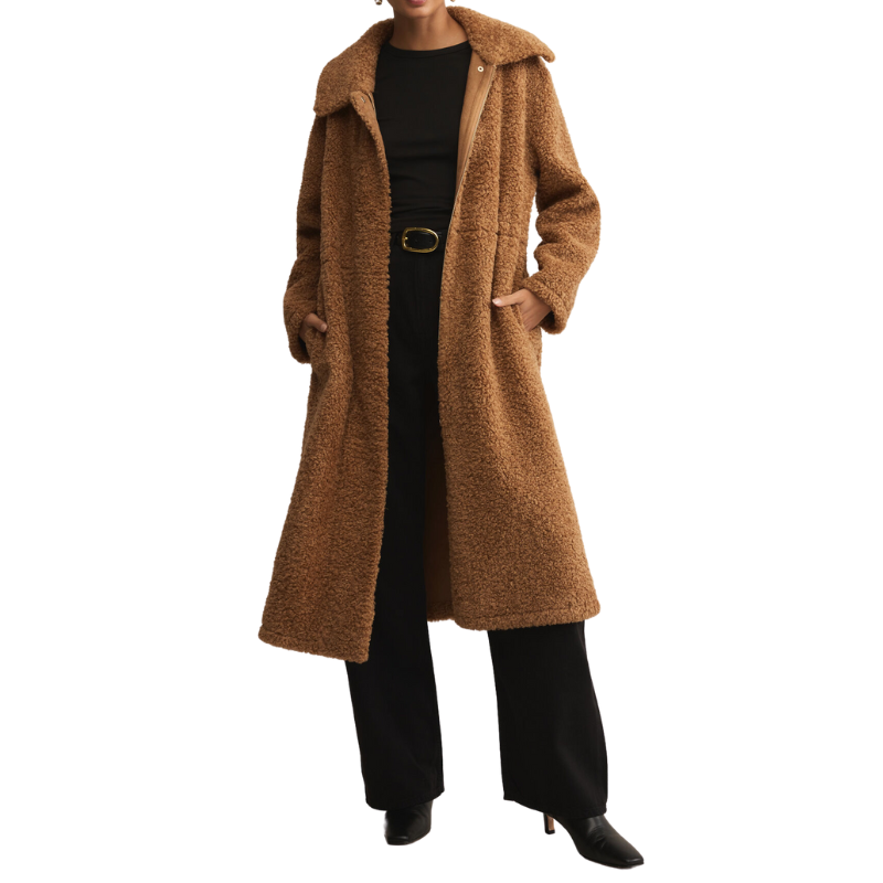 Brown coat worn by a person on a white background