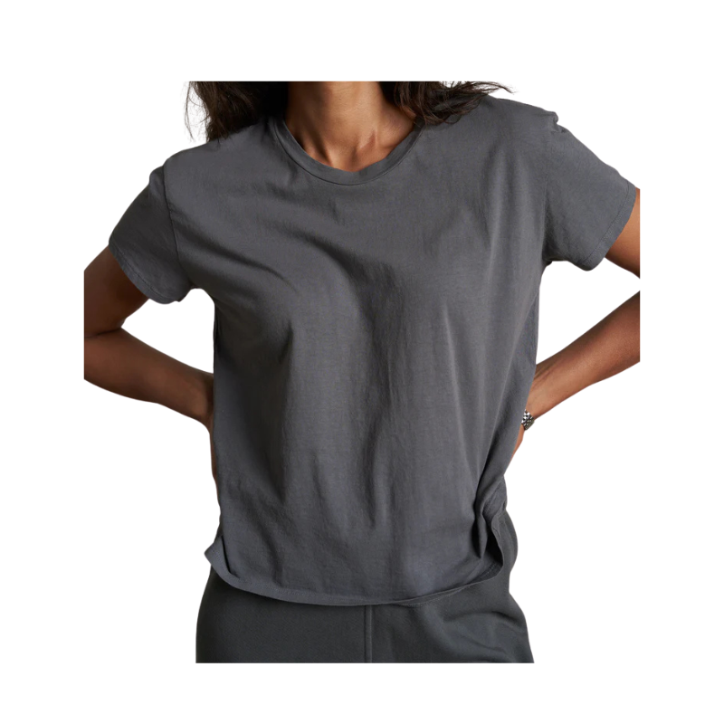 Person wearing a gray t-shirt on a white background