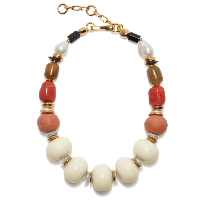 Multicolored beaded bracelet with gold accents on a white background