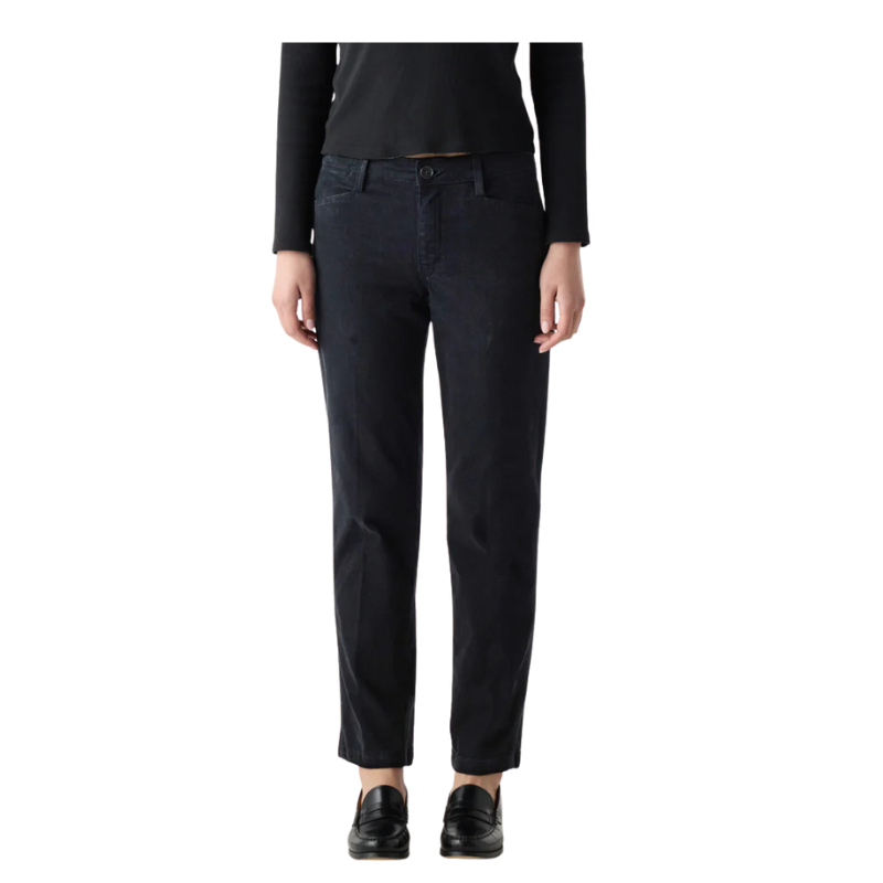 Person wearing black pants on a white background