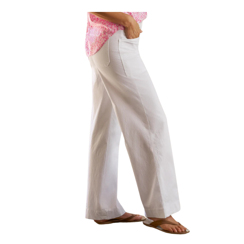 White pants worn by a person on a white background