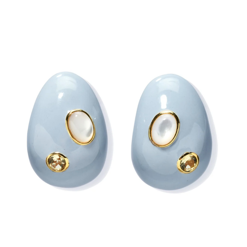 Pair of light blue earrings with gold accents on a white background
