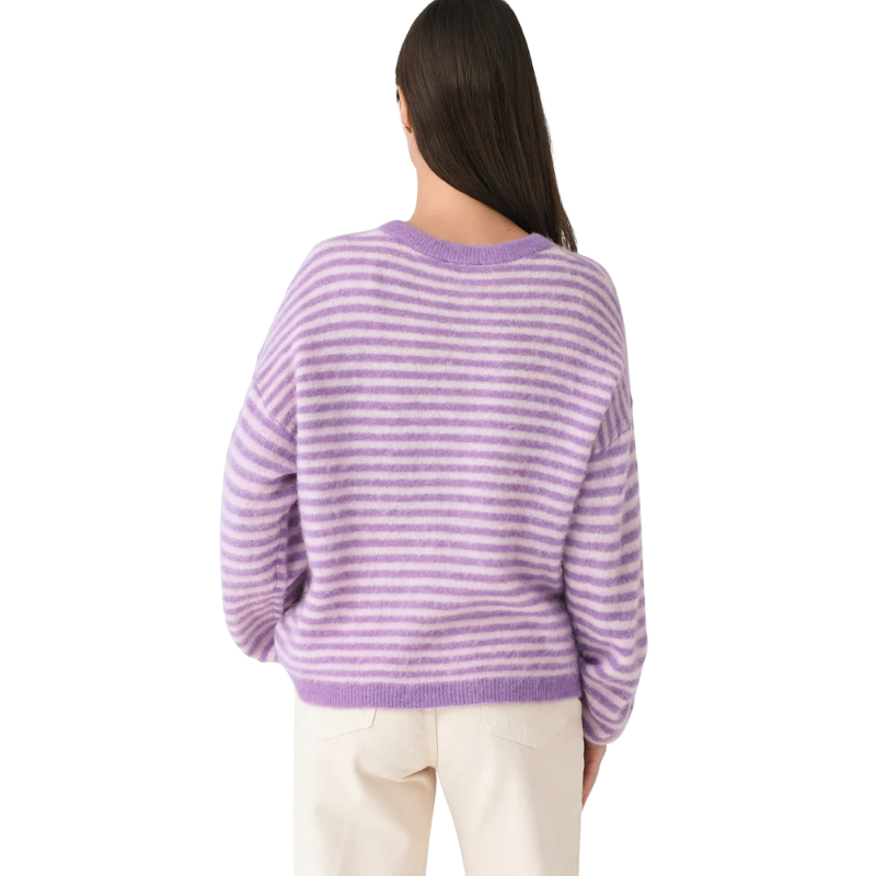 Person wearing a purple striped sweater on a white background