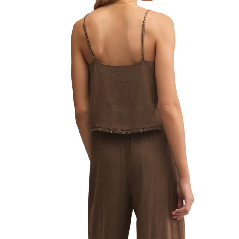 Brown sleeveless top and pants on a white background