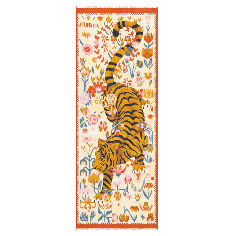 Decorative rug with tiger design on a white background
