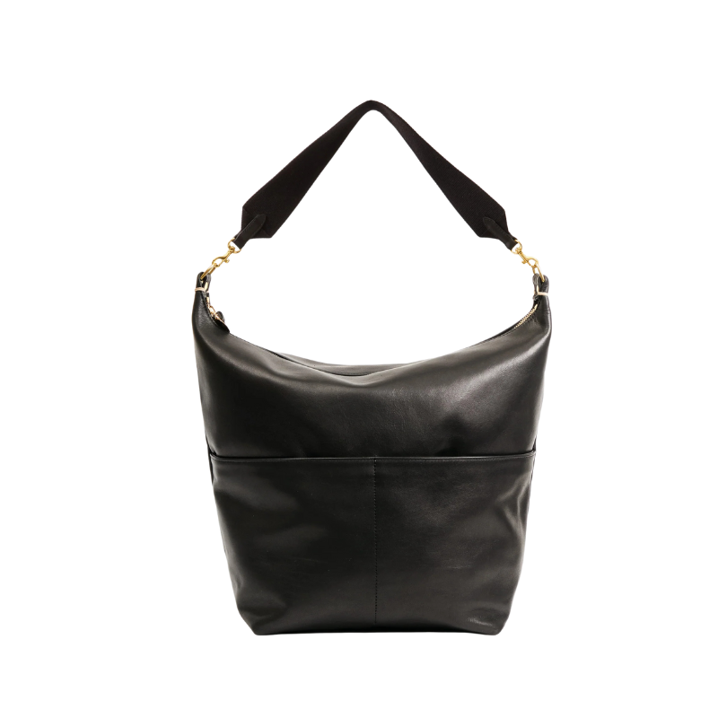 Black leather handbag with a strap on a white background