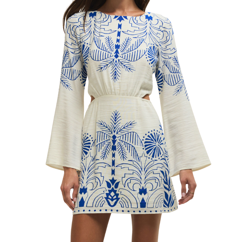 White dress with blue floral patterns on a white background