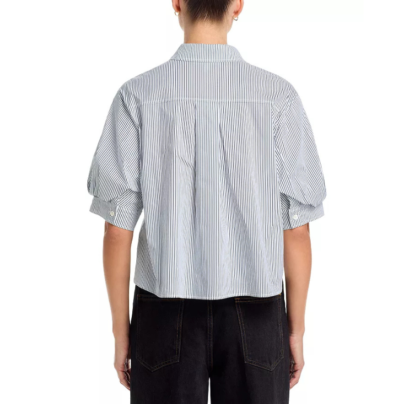 Person wearing a white and blue striped shirt with puffed sleeves on a white background