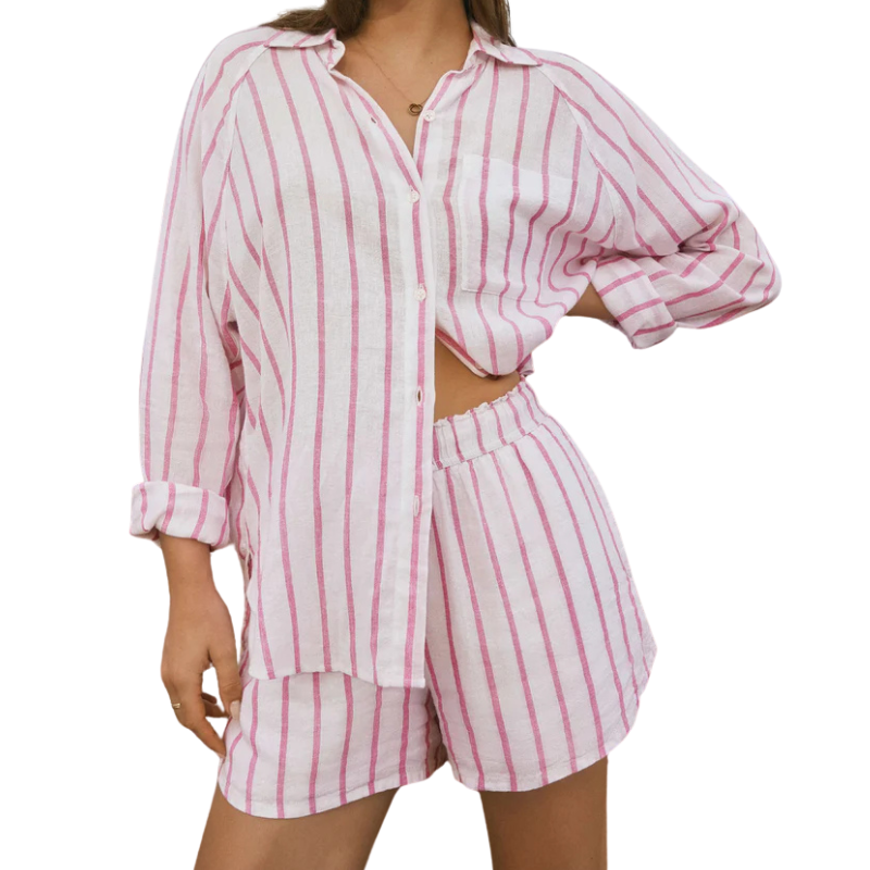 Pink and white striped shirt and shorts set on a white background