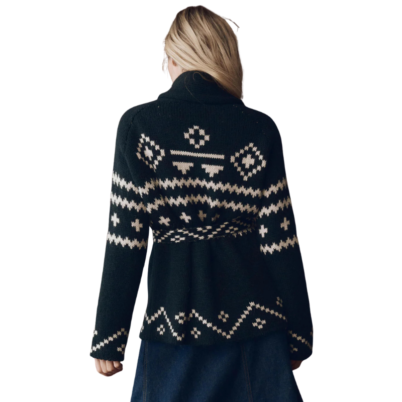 Navy blue sweater with white pattern worn by a person on a white background