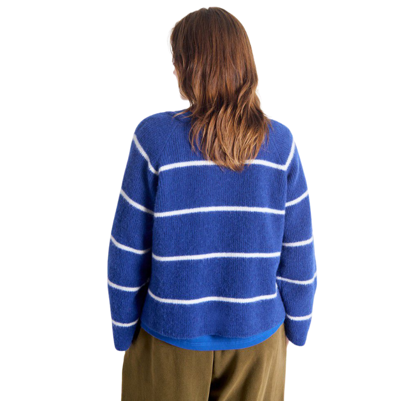 Person wearing a blue sweater with white stripes from behind on a white background