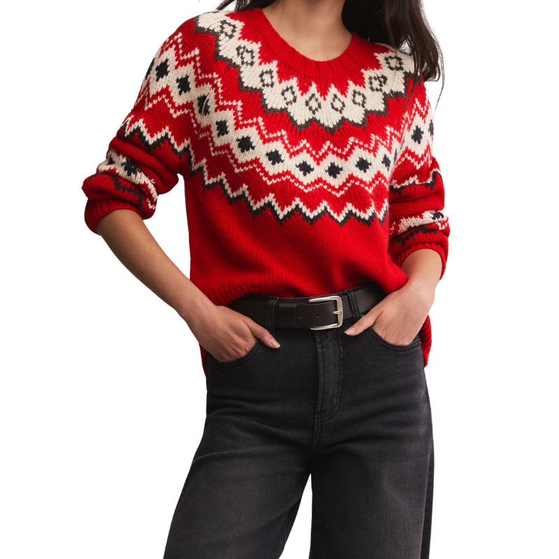Red sweater with a pattern worn by a person on a white background