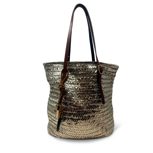 Woven handbag with a brown strap on a white background