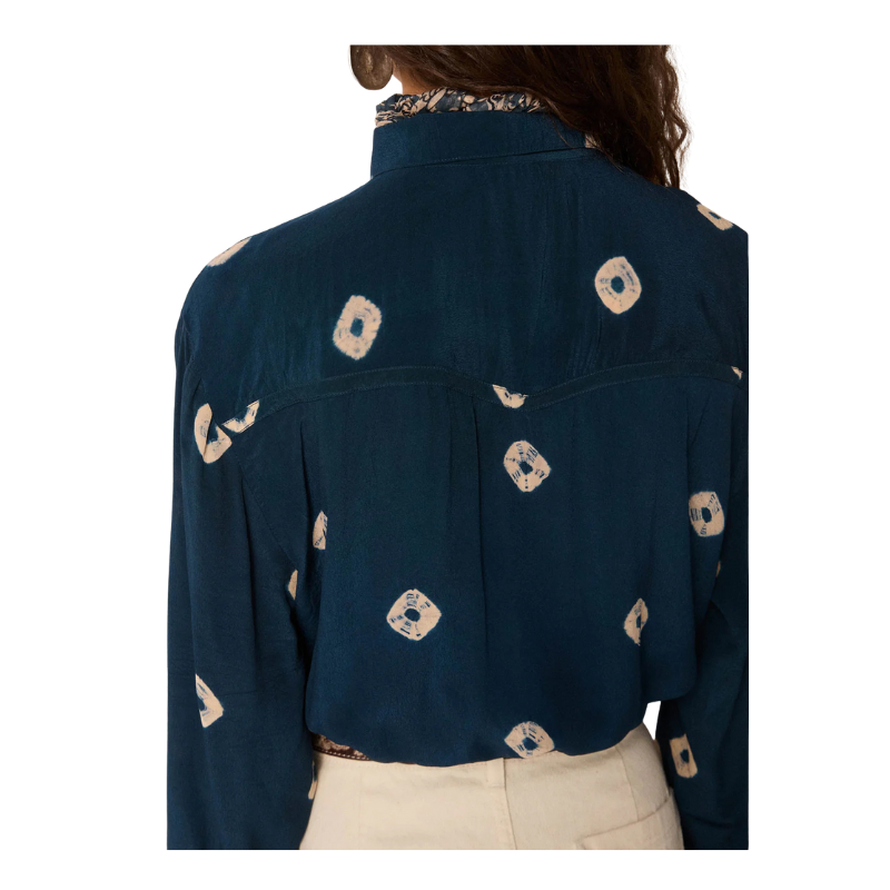 Navy blue jacket with beige floral patterns on a white background