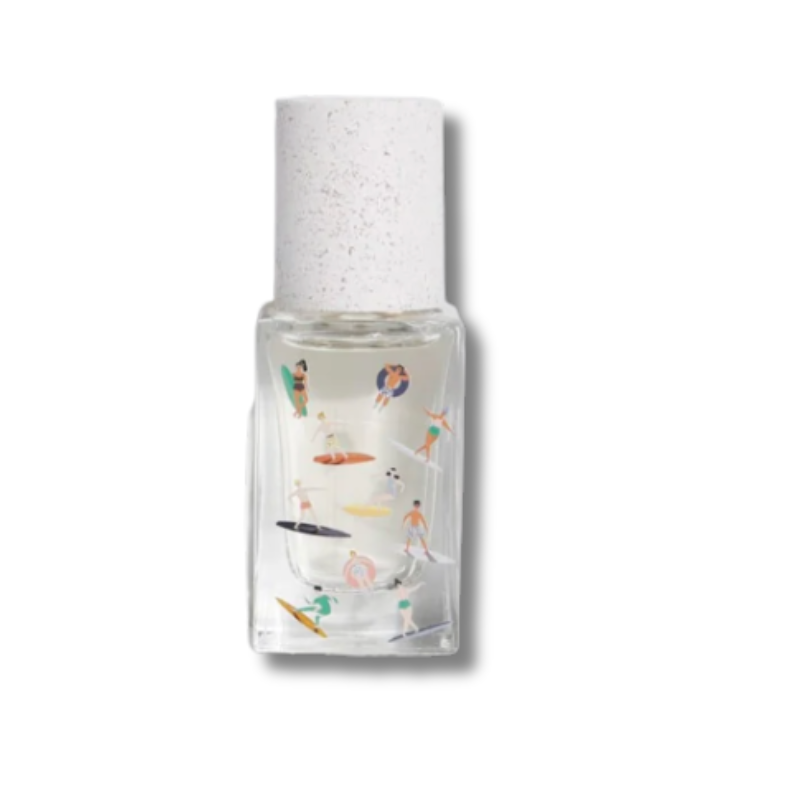 Nail polish bottle with beach-themed design on a white background