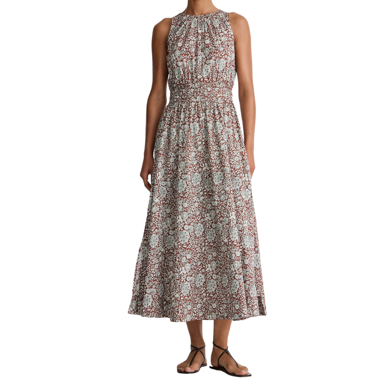 Woman wearing a floral dress on a white background