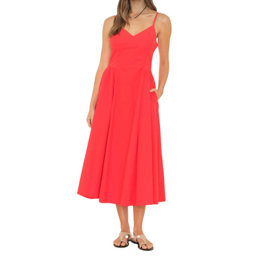 Red dress worn by a person on a white background