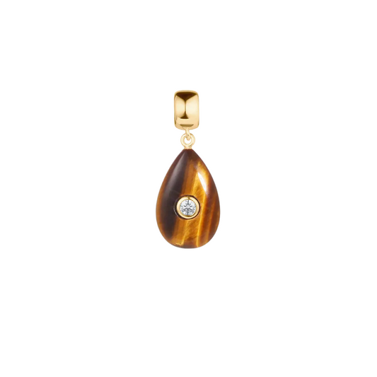 Teardrop-shaped pendant with gold frame and central gemstone on a white background