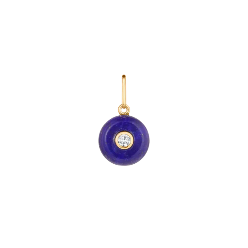 Gold pendant with a blue circular charm featuring a clear gemstone on a white background