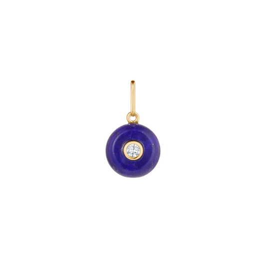 Gold pendant with a blue circular charm featuring a clear gemstone on a white background