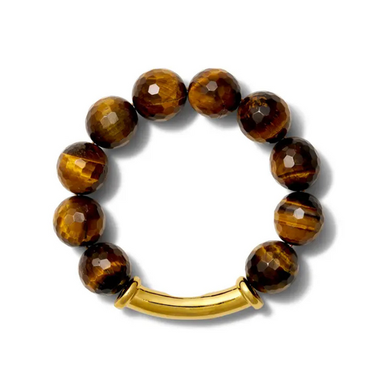 Bracelet with tiger eye beads and gold clasp on a white background