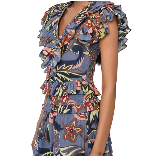 Multicolored floral dress with ruffled details on a white background