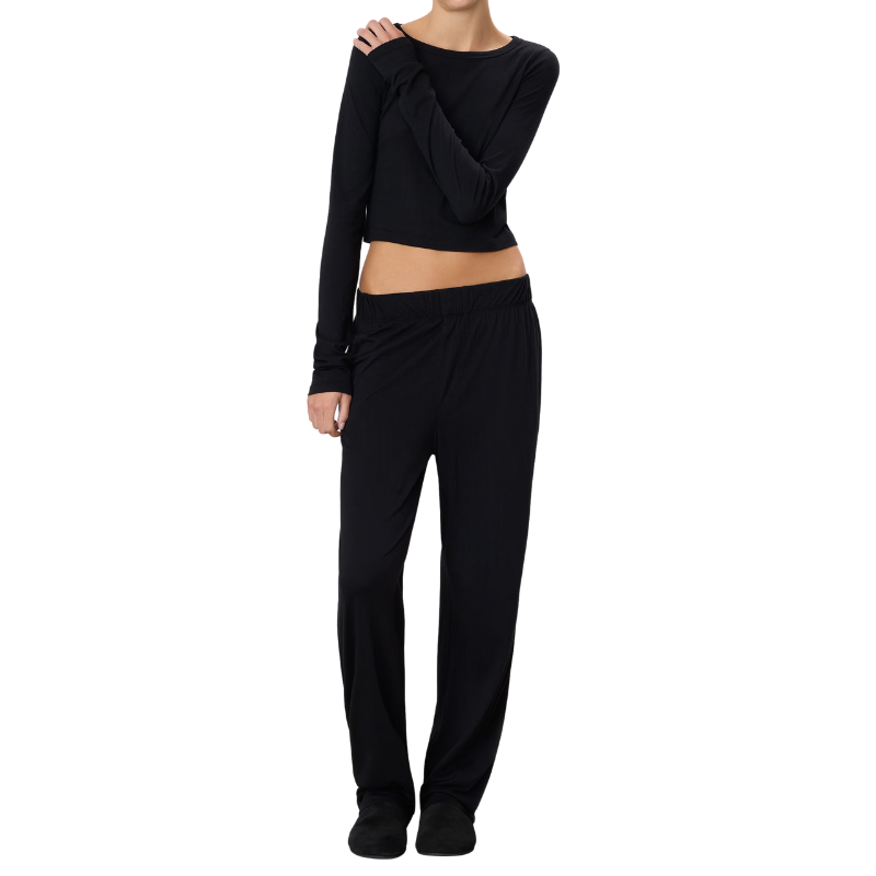 Black long-sleeve top and pants set on a white background