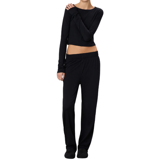Black long-sleeve top and pants set on a white background