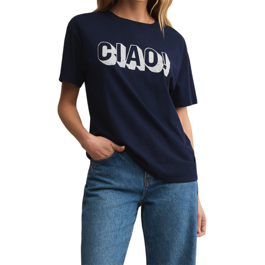 Person wearing a navy blue t-shirt with 'CIAO!' text and blue jeans on a white background