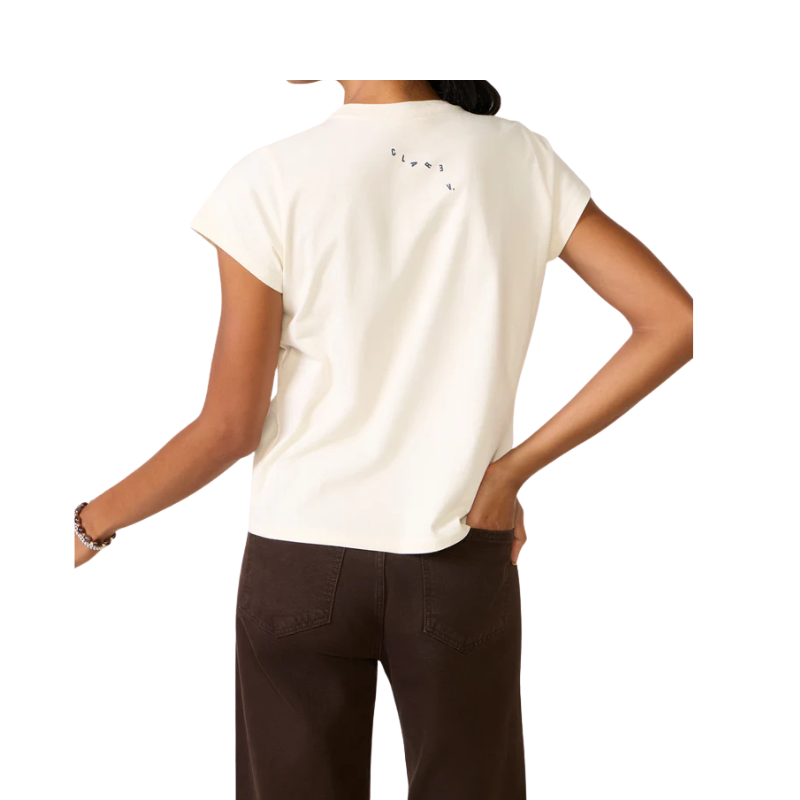 Person wearing a white t-shirt with text on the back, standing against a white background