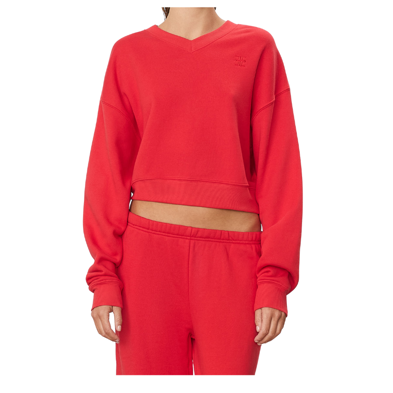Red sweatshirt and pants set on a white background