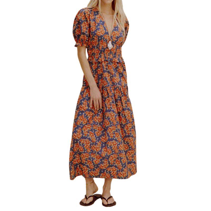 Woman wearing a floral dress on a white background