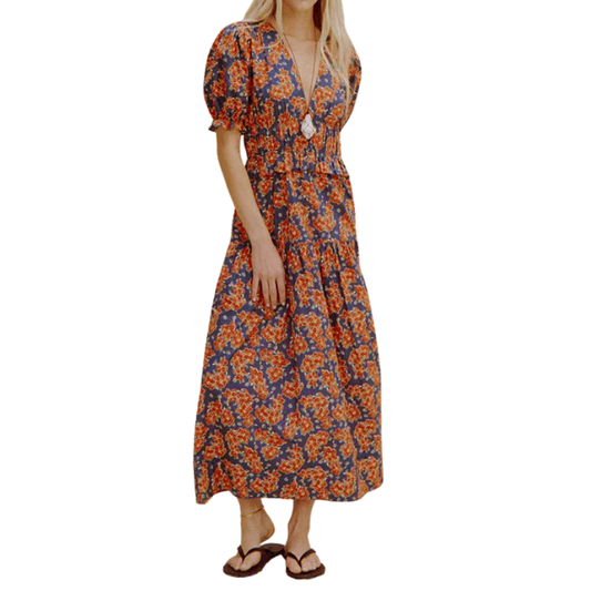 Woman wearing a floral dress on a white background