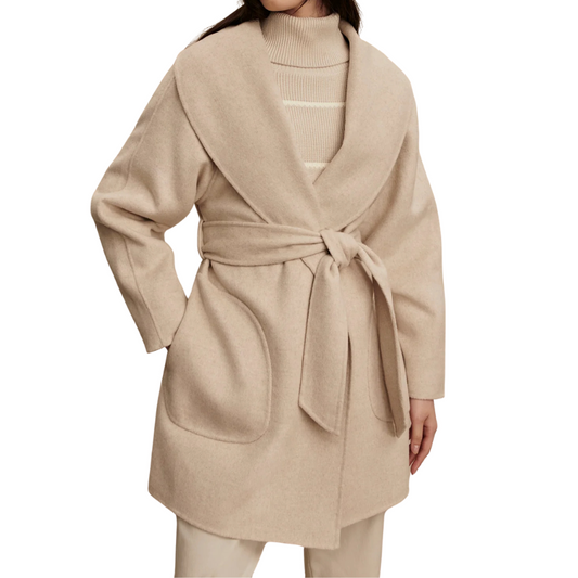 Beige wrap coat worn by a person on a white background