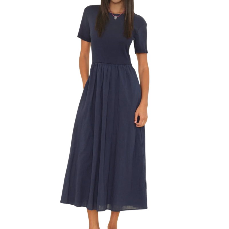 Navy blue dress worn by a model on a white background