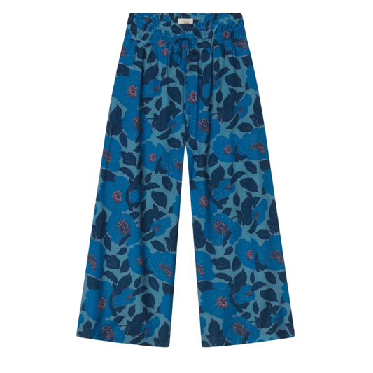 Blue floral-patterned pants on a white background