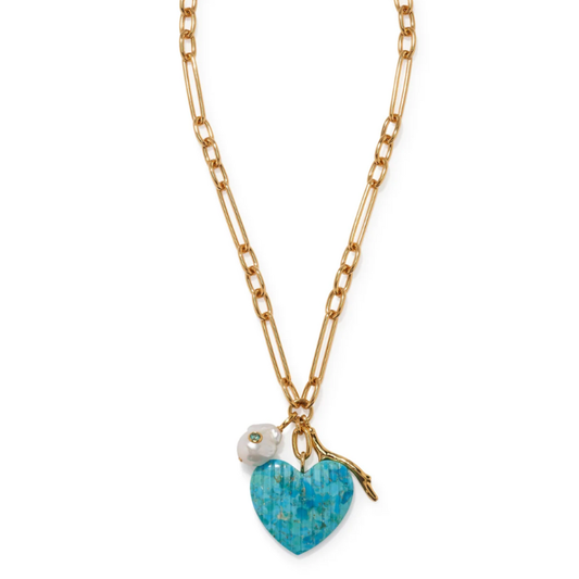 Gold necklace with a turquoise heart pendant on a white background