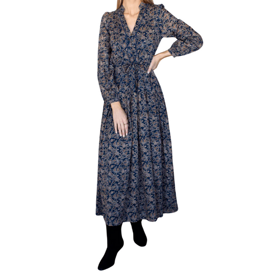 Long floral dress worn by a person on a white background