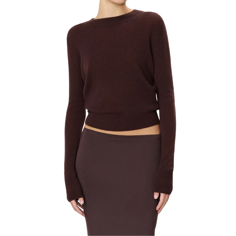 Brown sweater and skirt set on a white background