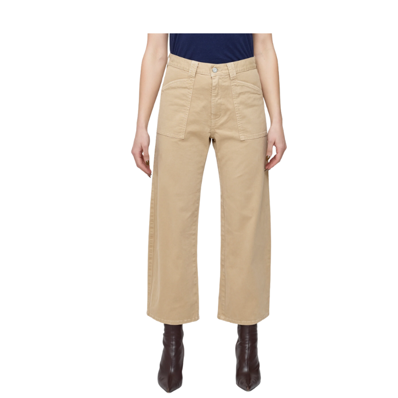 Person wearing beige pants on a white background