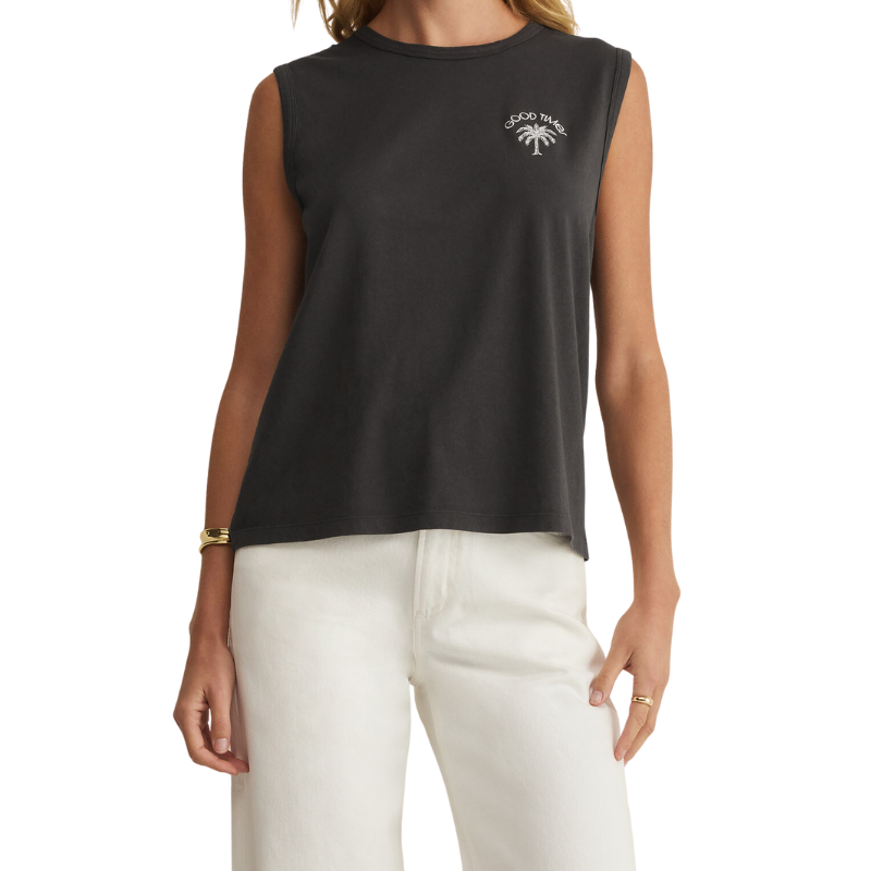 Black sleeveless top with a palm tree logo worn by a person on a white background