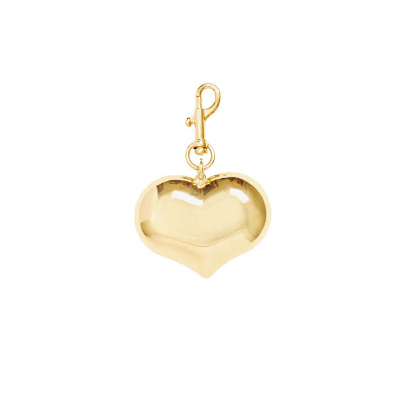 Gold heart-shaped charm on a white background
