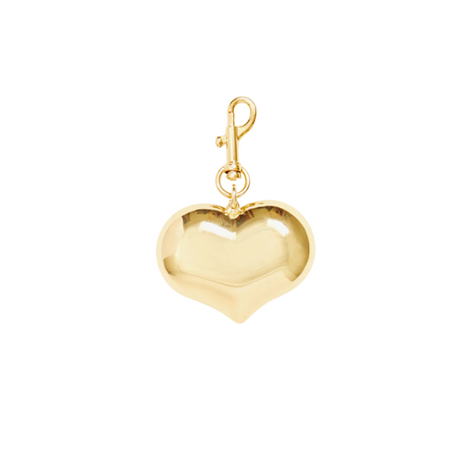 Gold heart-shaped charm on a white background
