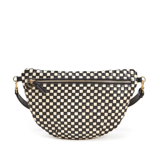 Black and white checkered bag with gold zipper on a white background