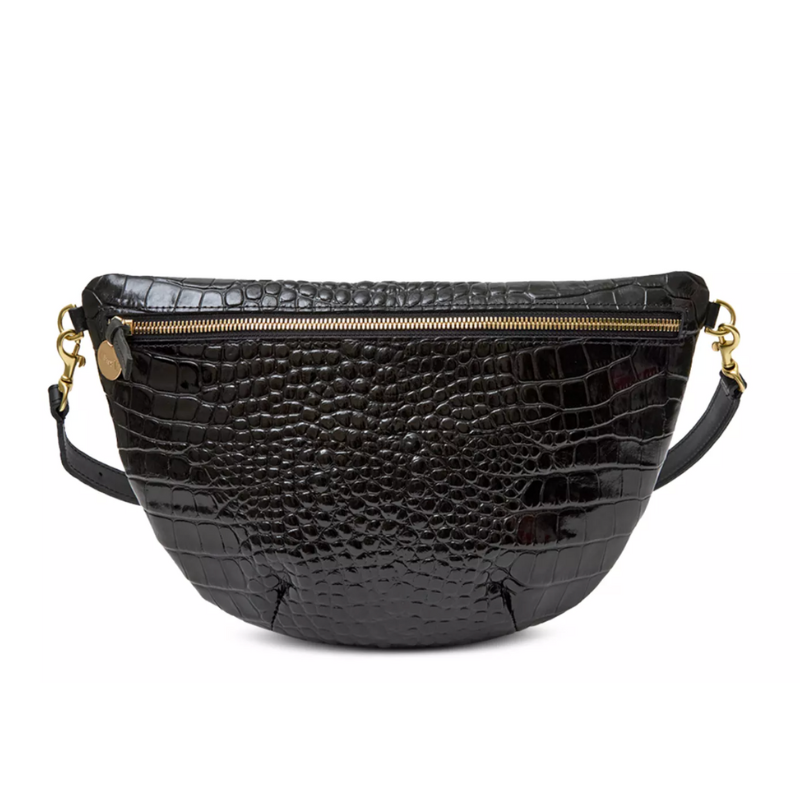 Black textured handbag with gold zipper and accents on a white background