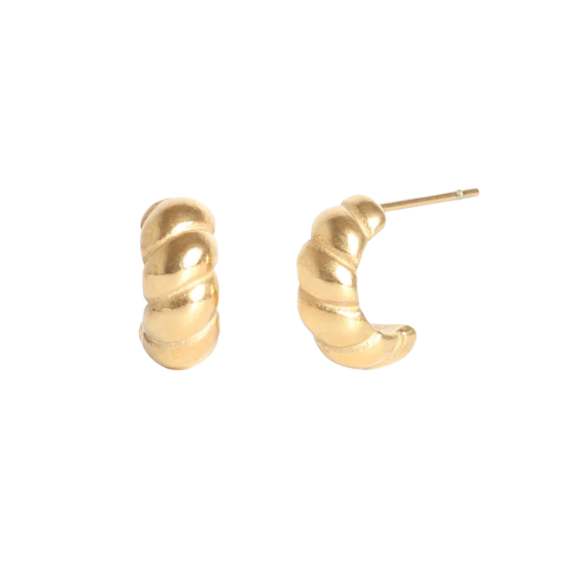 Gold hoop earrings on a white background