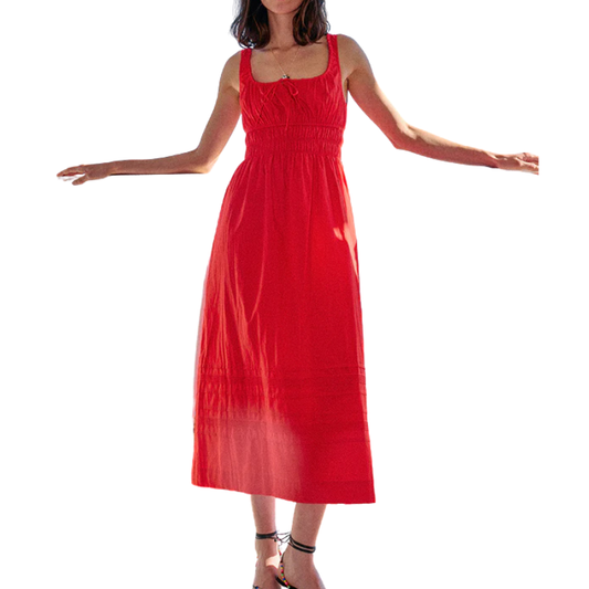 Red dress worn by a person on a white background
